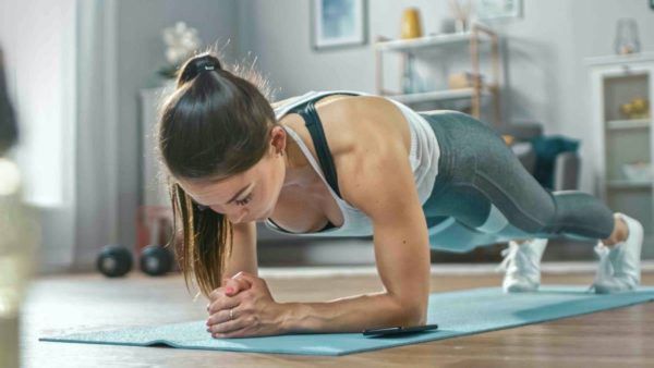 Can a Health and Fitness App Help You Lose Weight? 8 woman exercising with mobile fittness app Can a Health and Fitness App Help You Lose Weight? - 6
